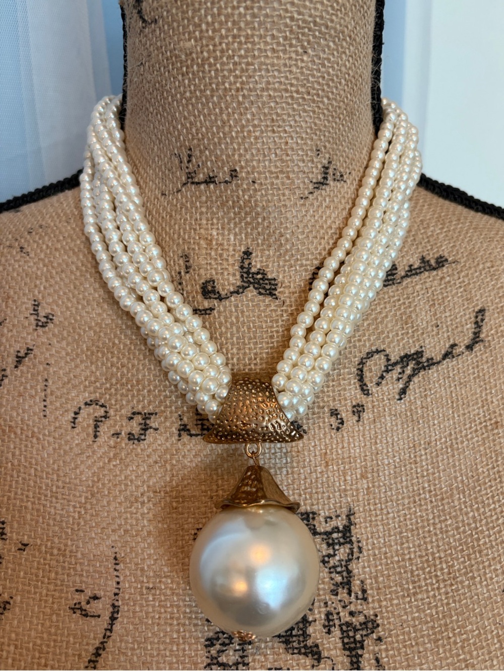 Elegant Pearl Strand Necklace with Gold Pendant